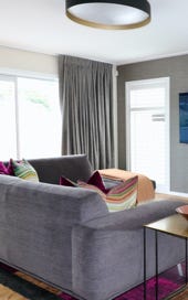 Family living with colourful cushions